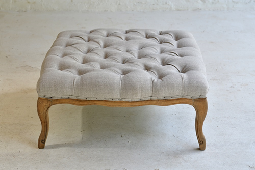 002 Ottomans - Medium dove grey upholstered linen ottoman 